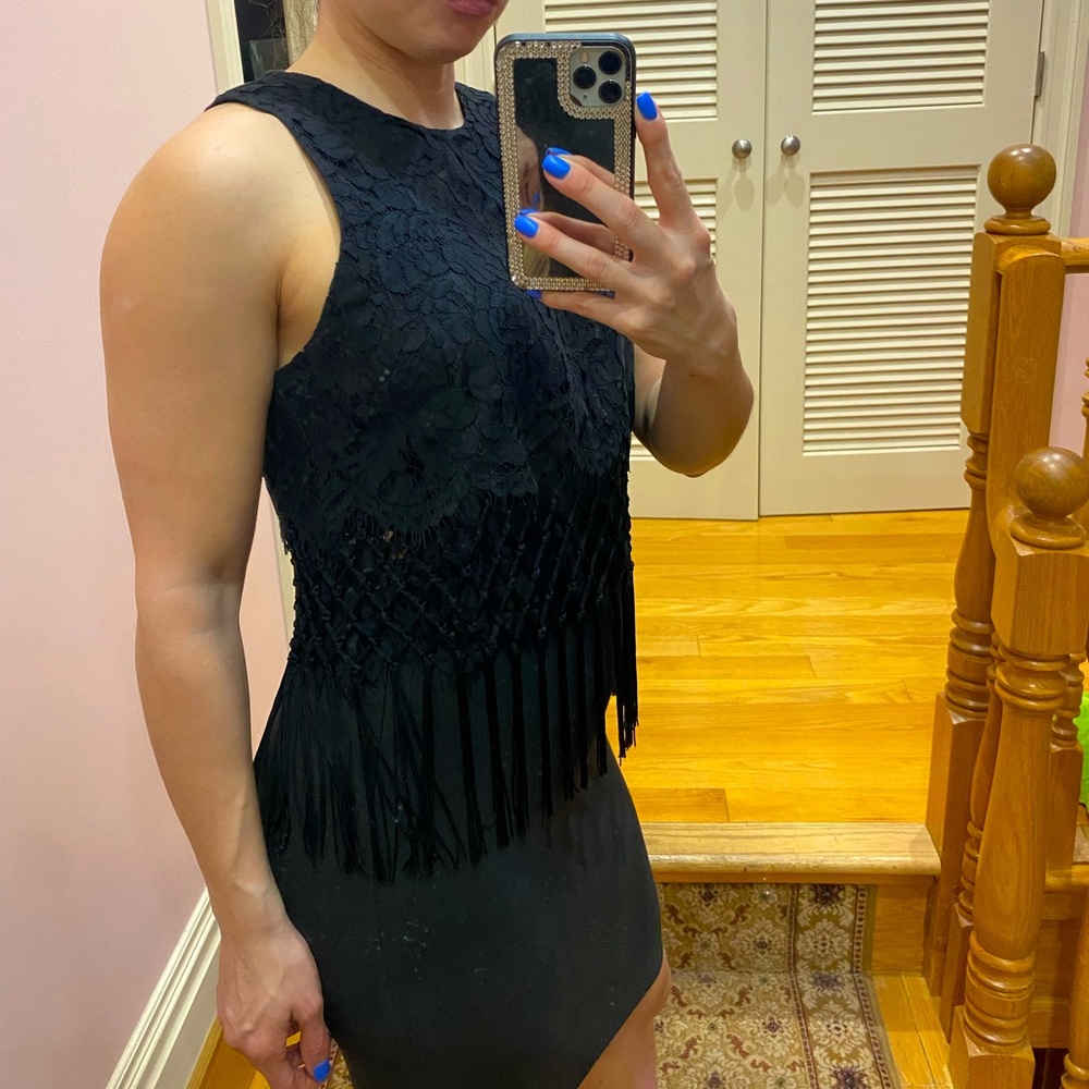 Fringe black top. Excellent condition.